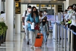 India lifts Quarantine Rules, India lifts Quarantine Rules, india lifts quarantine rules for foreign returnees, Face masks
